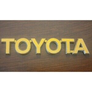 TOYOTA gold Car Truck Emblem Badge